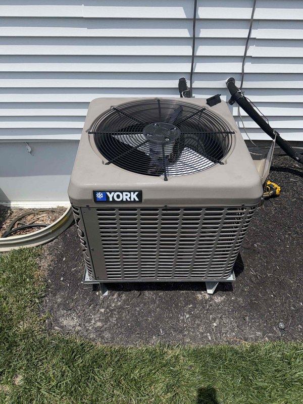 Responded to no cooling complaint on upstairs York system. Upon arrival, unit was already shut down by customer due to unusual noise concerns. Performed visual inspection of outdoor condensing unit and refrigerant line set. Equipment appeared in good physical condition with proper installation and no visible signs of damage, leaks, or deterioration. Refrigerant lines properly secured and insulated. Customer advised of diagnostic findings and service options to identify source of reported noise and cooling issue.