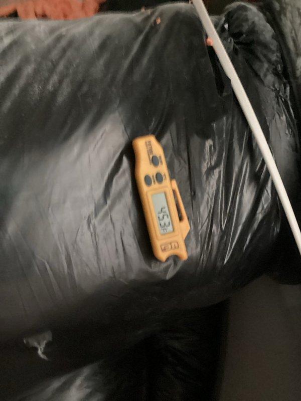 Completed comprehensive system inspection and tune-up on residential HVAC unit. Verified thermostat operation showing cooling mode at 67°F setpoint with proper indoor temperature reading, and measured supply air temperature at approximately 53-54°F at the ductwork, confirming adequate system performance and cooling output within normal operating parameters.