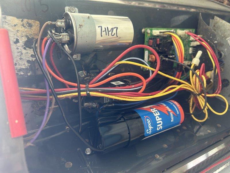 Responded to no cooling call and found outdoor unit not operating. Upon inspection, discovered heavy accumulation of organic debris including leaves, pine needles, and twigs throughout the condenser compartment, restricting airflow and preventing proper unit operation. Cleaned debris from unit interior, inspected capacitor and electrical connections for damage, and verified all wiring remained intact. Unit restored to proper cooling operation after cleaning and testing.