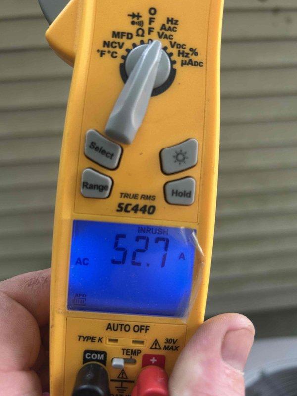 # HVAC Service Completed

Responded to no cooling callback on residential air conditioning system less than 10 years old. Upon arrival, performed diagnostic testing using digital multimeter to measure electrical parameters. Recorded compressor amperage draw of 52.7 amps during inrush testing to verify proper motor operation and rule out electrical failure.

Connected refrigerant manifold gauge set to service ports and measured system pressures on both high and low sides to assess refrigerant charge and overall system performance. Evaluated pressure readings against manufacturer specifications to determine if system was operating within normal parameters or experiencing refrigerant-related issues.

Diagnostic testing completed to identify root cause of repeat no cooling condition and determine appropriate corrective action.