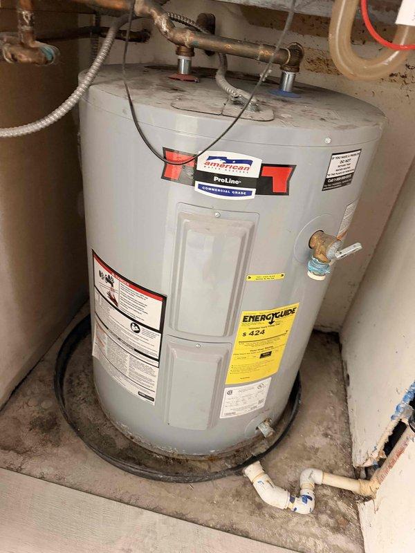 Completed on-site assessment for full HVAC system replacement and water heater replacement. The existing heating and cooling unit located in the hall closet is non-operational and requires complete replacement. Additionally, evaluated the American ProLine water heater for replacement, documenting current installation conditions including all piping connections, venting configuration, and utility room layout to provide comprehensive replacement estimate.