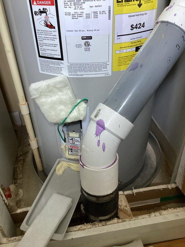 Performed scheduled maintenance service on a 50-gallon tall water heater with expansion tank that was installed in 2021. Completed comprehensive water heater flush procedure to remove sediment buildup and maintain optimal performance. Inspected all plumbing connections, verified proper operation of temperature and pressure relief valve, confirmed expansion tank functionality, and documented equipment condition with photographs showing proper installation, safety labeling, and associated condensate drainage system.