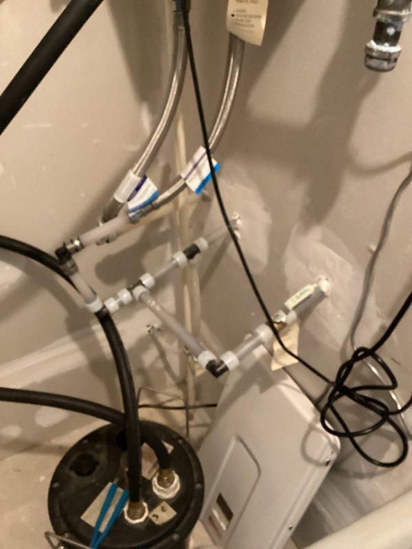 Performed comprehensive tankless water heater maintenance flush and inspection. Conducted descaling procedure on unit, flushed internal heat exchanger to remove mineral buildup, verified proper operation of all inlet and outlet valves, and confirmed system functionality. Water filtration system components inspected and found in good working condition.