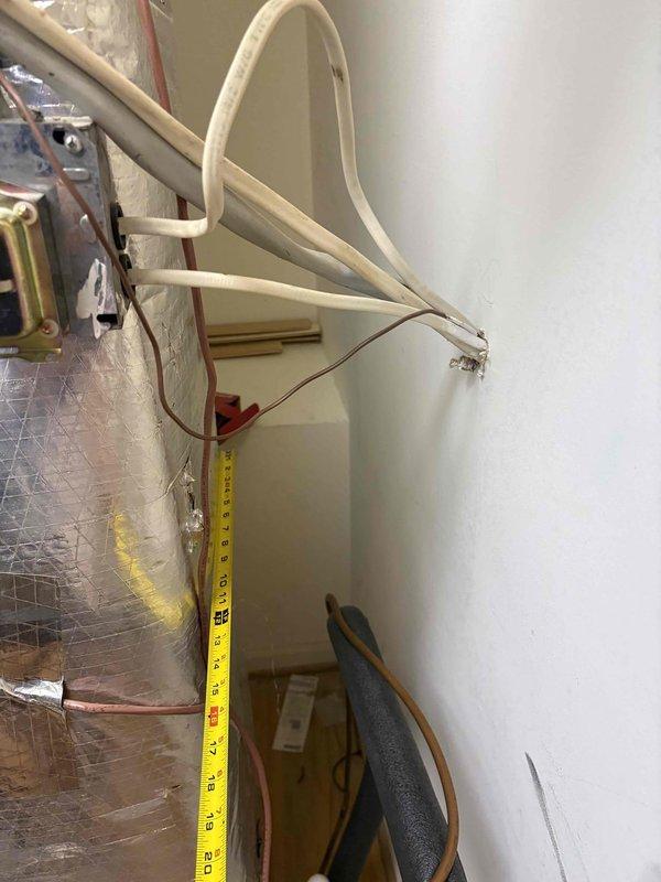Responded to no cooling complaint on lower level of dual-zone system. Found evaporator coil frozen due to continuous fan operation and reduced airflow. Measured supply duct dimensions and verified refrigerant lines. Instructed customer to turn system off to allow coil to thaw, switch thermostat fan from "on" to "auto" position, and verified upper zone operating normally at setpoint.