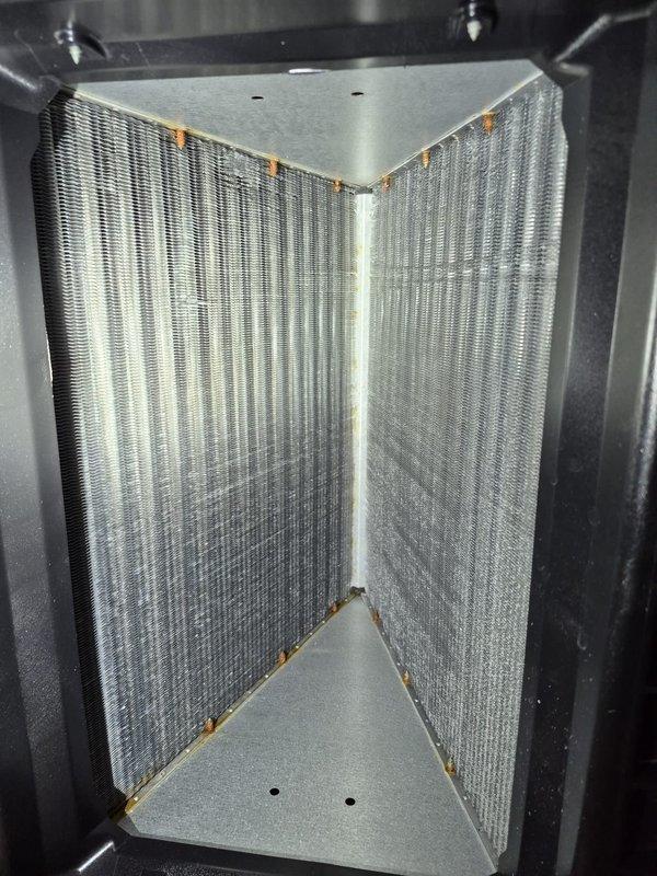 Replaced cracked horizontal drain pan on American Standard air handler model TEM4A0B24S21SB. Performed system pump down, installed new drain pan and filter drier, then recharged system and verified proper operation and drainage.