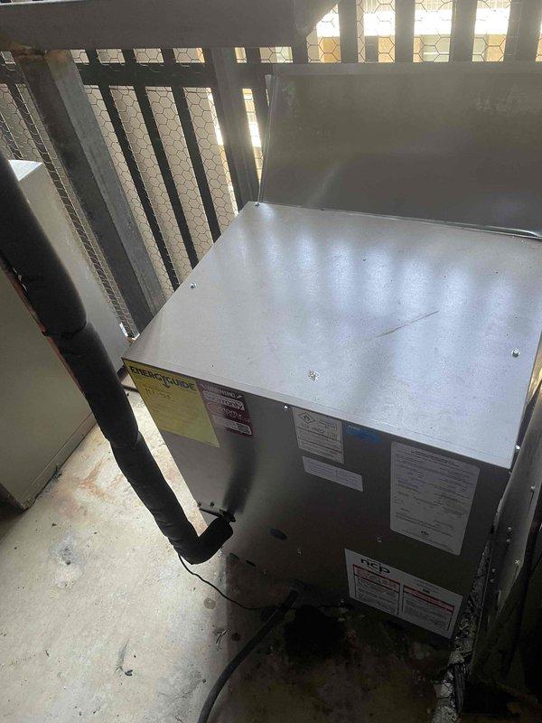 Completed full HVAC system replacement including removal and disposal of existing equipment. Installed National Comfort Product NCP5241000A-A1 2-ton side discharge air conditioning unit in condenser closet, Lennox CBK43UHET-024 air handler with Lennox 10KW electric heat kit, and Honeywell TH6320WF digital WiFi thermostat. Fabricated and installed metal duct transitions to adapt new equipment to existing ductwork. Reused existing condensate drain lines and power lines where feasible. Replaced outdoor electrical disconnect and whip for code compliance. All equipment installed per manufacturer specifications with one-year parts warranty from installation date. System tested and operational upon completion.