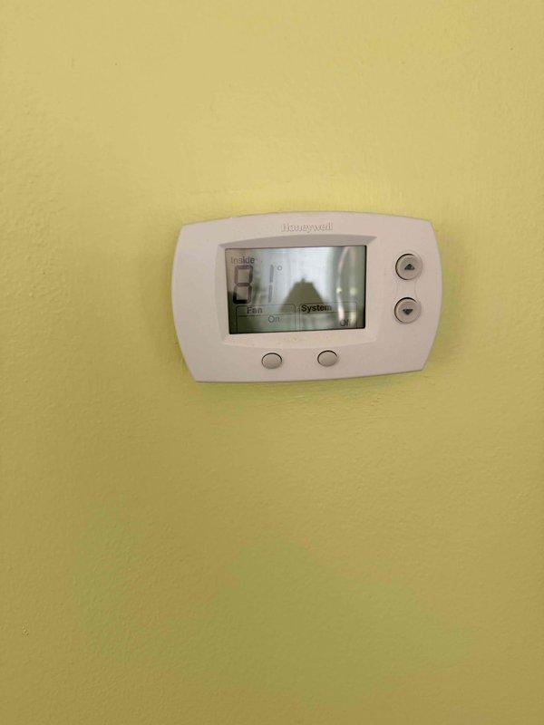 Conducted comprehensive consultation for HVAC system replacement, reviewing existing equipment including vertical air handler unit with condensate drain system and Honeywell digital thermostat. Discussed replacement options, installation procedures, and system specifications with homeowner to determine optimal solution for their heating and cooling needs.