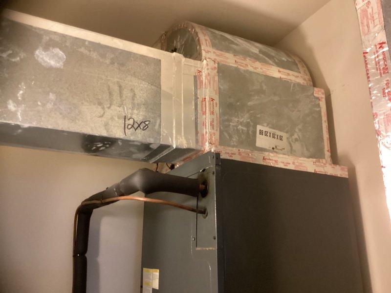 Conducted on-site estimate for complete HVAC system replacement of existing 13-year-old equipment. Evaluated current furnace and air handler unit located in mechanical room, noting existing ductwork configuration with mixed insulation coverage and documented Honeywell equipment interface module for system compatibility assessment.