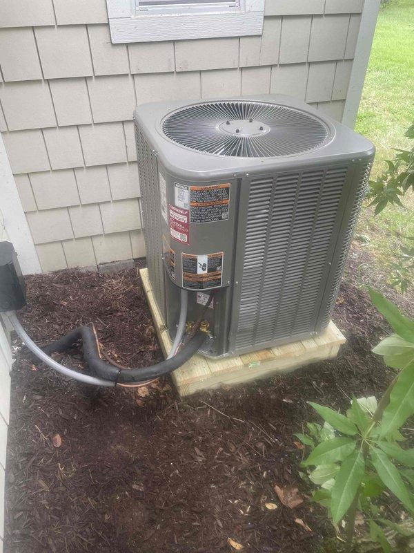 Completed full HVAC system replacement including removal and disposal of existing equipment. Installed ML14KP1-030 2.5 ton 14.3 SEER heat pump on exterior platform with whip and disconnect, CBK45UHVT-30 variable speed fan coil unit on seated return plenum, ECB45-10CB 10 kW electric heater with breaker, and S1200WF WiFi thermostat. Flushed, pressure tested, and recharged refrigerant lines to manufacturer specifications. Extended maintenance contract for one year coverage on single-system residence.
