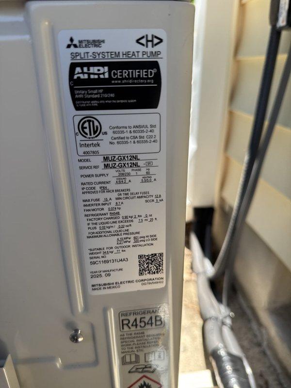 Removed and disposed of existing HVAC system. Installed Mitsubishi Electric MUZ-GX12NL heat pump outdoor unit on risers atop existing pad and MSZ-GX12NL indoor fan coil unit. Ran new 35-foot refrigeration lineset with R454B refrigerant, condensate drain line, and low voltage control wiring. Utilized existing line penetration where possible; otherwise installed new PVC line hide for aesthetic concealment. Installed new surge disconnect with whip assembly while utilizing existing power wiring from disconnect to outdoor unit. Mounted outdoor unit on equipment risers for proper elevation and drainage. Performed system startup, charged refrigerant to manufacturer specifications, and verified all operating parameters using digital manifold gauges. Confirmed proper heating and cooling operation with all electrical values within acceptable ranges per unit nameplate specifications.
