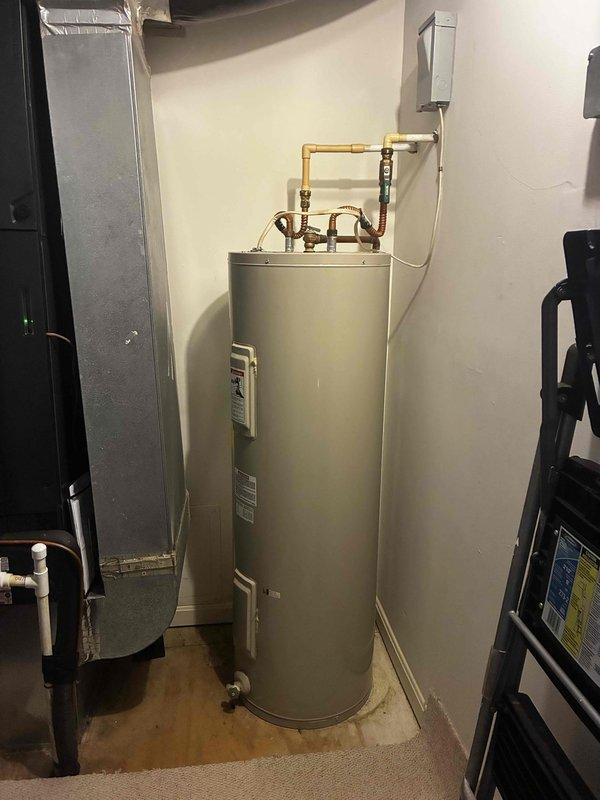 # HVAC Maintenance - Cooling System Service

Completed scheduled preventive maintenance cooling visit for residential HVAC system. Performed comprehensive inspection of cooling equipment, air handler, and associated components in basement utility area. Verified proper operation of system controls, checked refrigerant levels, inspected electrical connections, and cleaned condenser coils as needed. All cooling system components found to be operating within normal parameters. Documented equipment conditions with photos for service records.
