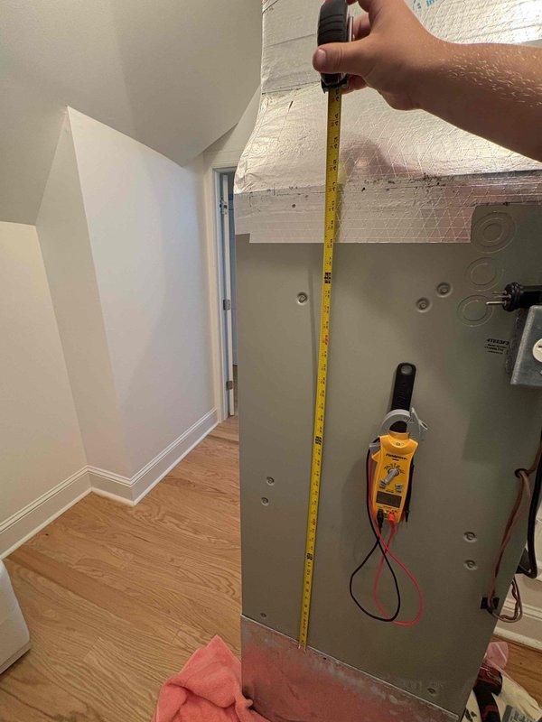 Responded to no cooling complaint on third floor air handler unit. Upon arrival, found ice formation on indoor coil indicating restricted airflow or low refrigerant condition. Instructed occupant to turn system off and set fan to continuous operation to allow ice to thaw. Performed diagnostic measurements of air handler and electrical components. Evaluated condensate pump operation and drainage system. Inspected air filter for restrictions that could contribute to coil icing. Documented equipment dimensions and electrical readings for further analysis once coil has fully defrosted.