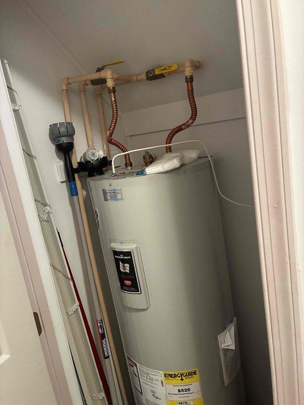 Performed routine maintenance water heater flush on residential tanked unit as part of recurring service visit. Drained sediment from tank bottom, inspected temperature and pressure relief valve for proper operation, and verified all plumbing connections including flexible water lines and expansion loops were secure with no visible leaks. Confirmed unit operational status and proper heating function upon completion of flush procedure.