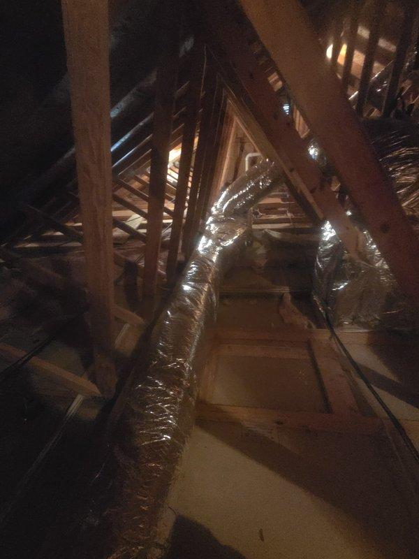 Completed full geothermal HVAC system installation including removal and disposal of existing ductwork. Installed new insulated metal trunk duct with flexible supply and return branches throughout attic and crawl space areas. Mounted Geostar G5SZ036 split geothermal unit with G5BM036 fan coil unit in closet using downflow configuration. Installed TPCC32U03WGSR thermostat for system control and ran all necessary refrigeration lines, condensate drain, and low voltage wiring between indoor and outdoor units. Performed system flush and startup procedures to verify proper operation. Applied 10-year extended warranty coverage to equipment.