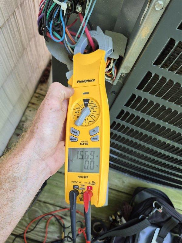 Completed routine cooling maintenance visit at clubhouse location requiring FOB access from property management. Performed comprehensive system inspection and diagnostics using clamp meter, recording amp draw of 15.59 amps indicating normal compressor operation. Measured supply air temperature at 36.5°F at evaporator coil, confirming proper refrigerant charge and efficient heat exchange. All electrical connections inspected and found secure, system operating within manufacturer specifications with no deficiencies noted.