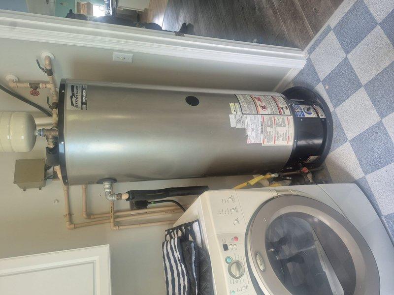 Provided estimate for upgrading existing 40-gallon water heater to 50-gallon unit with expansion tank installation in utility room. Assessed feasibility and requirements for relocating water heater approximately 1-5 feet from current position within same room. Evaluated plumbing infrastructure and provided quote for installing outdoor shower with complete rough-in plumbing connections.