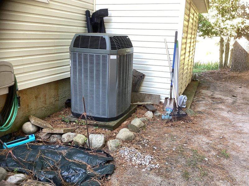 Conducted site assessment for complete Trane system replacement located in garage with convenient access. Evaluated existing outdoor condensing unit and indoor components, documented equipment specifications and installation requirements, and provided comprehensive replacement estimate for new HVAC system.