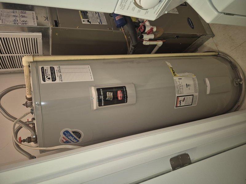 # Cooling System Maintenance Visit

Performed routine cooling maintenance on residential HVAC system located in utility closet with water heater. Inspected Carrier air handler unit and associated equipment for proper operation. Verified thermostat functionality and system controls. Checked condensate drainage and ensured all mechanical components were operating within normal parameters. System found to be in good working condition with no immediate service needs identified.