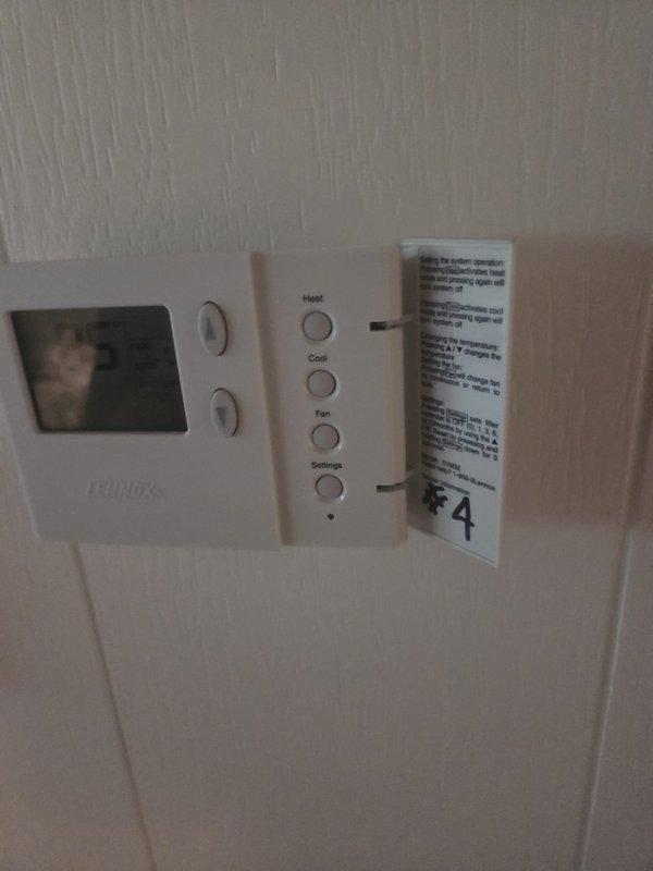 Responded to no cooling call where thermostat was clicking but no airflow from system. Upon arrival, inspected outdoor condensing unit and Runtal thermostat control panel, documented equipment condition with photos. Diagnosed issue and provided customer with repair options and associated service information.