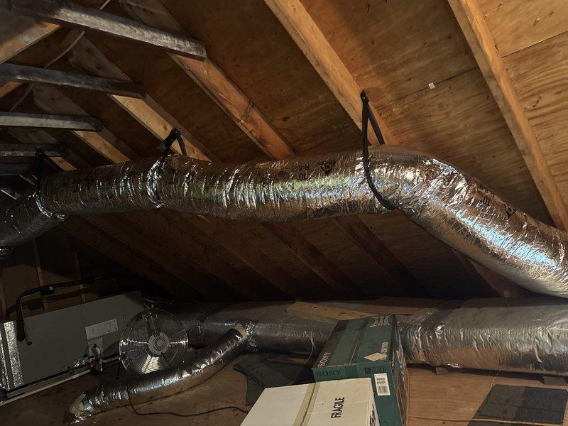 Completed full HVAC system replacement including removal and disposal of existing equipment. Installed 5A6H7036 3-ton 17 SEER heat pump outdoor unit on existing platform. Installed 5TEM6D04 variable speed fan coil unit with 15KW electric heater and breaker in drain pan with shutoff valve in attic space. Flushed, pressure tested, and recharged refrigeration lines to manufacturer specifications. Upgraded return air system by enlarging return flex duct to 16" diameter and increasing hall ceiling return register size to improve airflow and system efficiency. Installed 1" filter rack and THX1200W WiFi thermostat for enhanced system control. All equipment tested and operational upon completion.