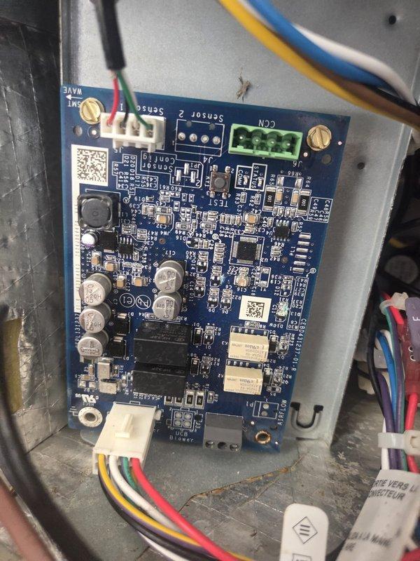 # HVAC Service Report

Responded to no cooling complaint for downstairs zone. Upon inspection, accessed control board and sensor assembly within air handling system. Evaluated circuit board connections, relay operations, and sensor functionality. Inspected Sensirion sensor mounted on refrigerant lines, noting age-related corrosion on copper piping but sensor appeared operational. Verified all wire connections at control board terminals and multi-pin connectors were secure. Checked system components for proper communication and operation to restore cooling to affected zone.
