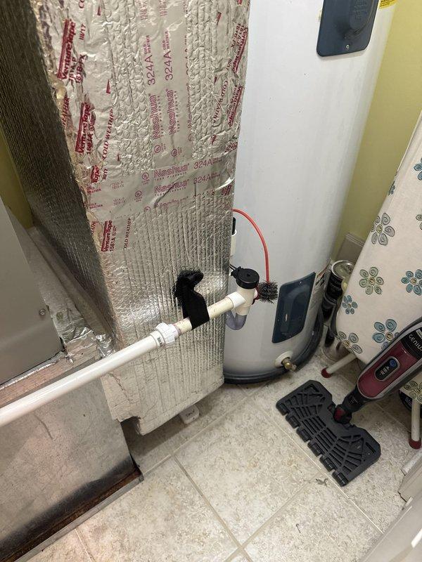 Responded to no cooling call where indoor fan was operational but no cool air was produced. Upon arrival, accessed HVAC equipment in utility area with exposed wall construction. Performed diagnostic testing using digital measuring instruments on system components. Identified issue with cooling system performance. Unit required repair to restore proper cooling function and return system to normal operation.