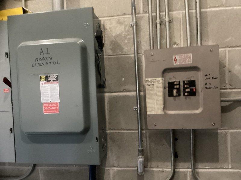 Conducted site evaluation for ductless heat pump installation in mechanical room housing elevator electrical equipment and building control systems. Assessed electrical infrastructure including 208 VAC 3-phase panel, documented existing conduit routing, and determined optimal mounting locations for indoor and outdoor mini-split components to provide climate control for equipment room while maintaining accessibility to electrical panels and elevator disconnect.