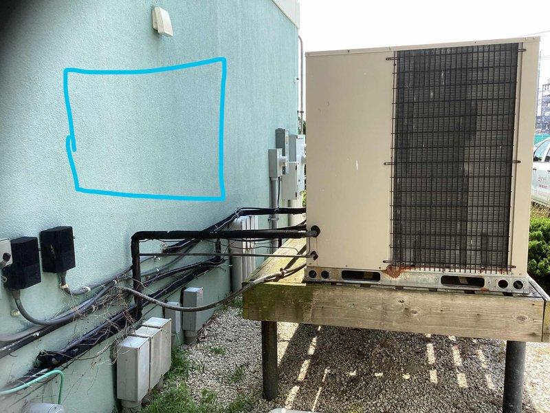 Completed estimate for ductless mini-split system installation in machine room with concrete block construction. Evaluated exterior wall placement for condenser unit on elevated platform and interior head unit mounting location, documented refrigerant line routing through exterior wall penetration, and assessed electrical requirements for system connection.