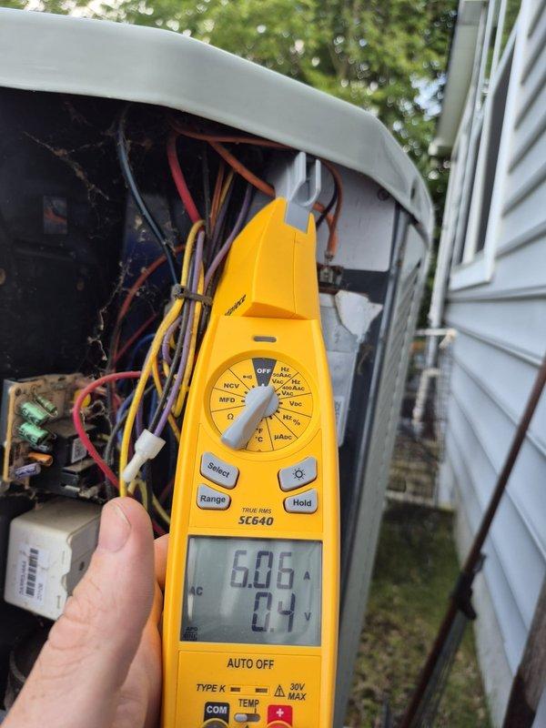 Performed comprehensive preventive maintenance inspection on single HVAC system. Conducted electrical diagnostics using multimeter, verifying voltage readings at 24V control circuit and measuring amperage draw at 75.3A on compressor circuit. Inspected capacitor, wiring connections, and control board for proper operation. Removed access panel to access internal components, checked all wire terminations and connections for security. System operating within normal parameters upon completion of tune-up service.