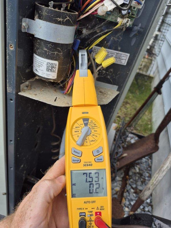 Performed comprehensive preventive maintenance inspection on single HVAC system. Conducted electrical diagnostics using multimeter, verifying voltage readings at 24V control circuit and measuring amperage draw at 75.3A on compressor circuit. Inspected capacitor, wiring connections, and control board for proper operation. Removed access panel to access internal components, checked all wire terminations and connections for security. System operating within normal parameters upon completion of tune-up service.