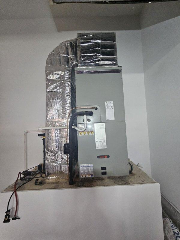 Completed comprehensive tune-up and inspection on two HVAC systems. Inspected air handler unit with connected ductwork, verified proper installation of condensate drain lines, and documented equipment conditions. All systems found operating within normal parameters with no immediate service needs identified.