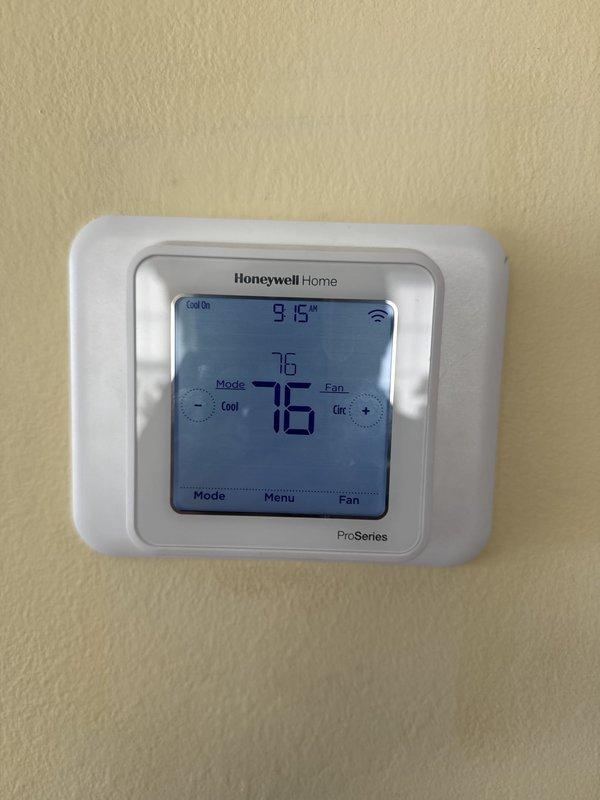 Completed routine cooling maintenance visit on two HVAC systems. Inspected and verified proper operation of both Honeywell Home ProSeries thermostats, confirming accurate temperature readings, WiFi connectivity, and cooling cycle functionality with systems operating within normal parameters.