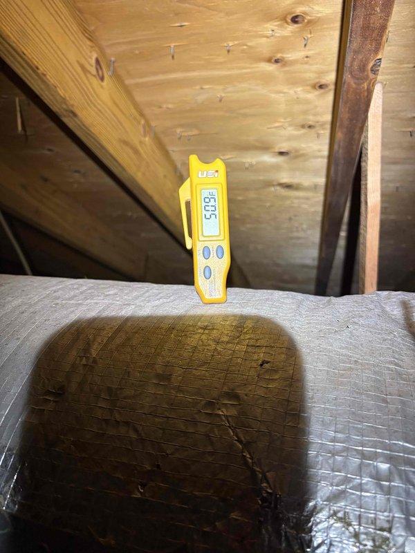 Responded to no cooling complaint at residential property where new homeowner reported inadequate cooling performance following recent packaged terminal unit installation by previous owner. Upon arrival, found thermostat set to 80°F with current temperature reading of 70°F. Accessed attic-mounted HVAC equipment and performed diagnostic testing, measuring supply air temperature at 58.94°F at the unit. Documented system conditions and thermostat settings with photos for service records. Discussed system performance expectations and potential optimization options with homeowner, including available maintenance programs for ongoing system efficiency.