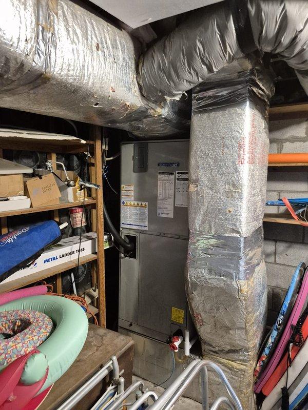 Responded to no cooling complaint on main level system with outdoor unit tripping off on safety. Upon arrival, found ODU experiencing electrical issues causing unit to shut down during operation. Inspected air handler and ductwork in basement mechanical space, noting standard installation with insulated supply ducts and proper equipment mounting. Diagnosed outdoor unit fault, addressed the tripping condition, and restored system to normal cooling operation. Unit tested and confirmed operating within manufacturer specifications.