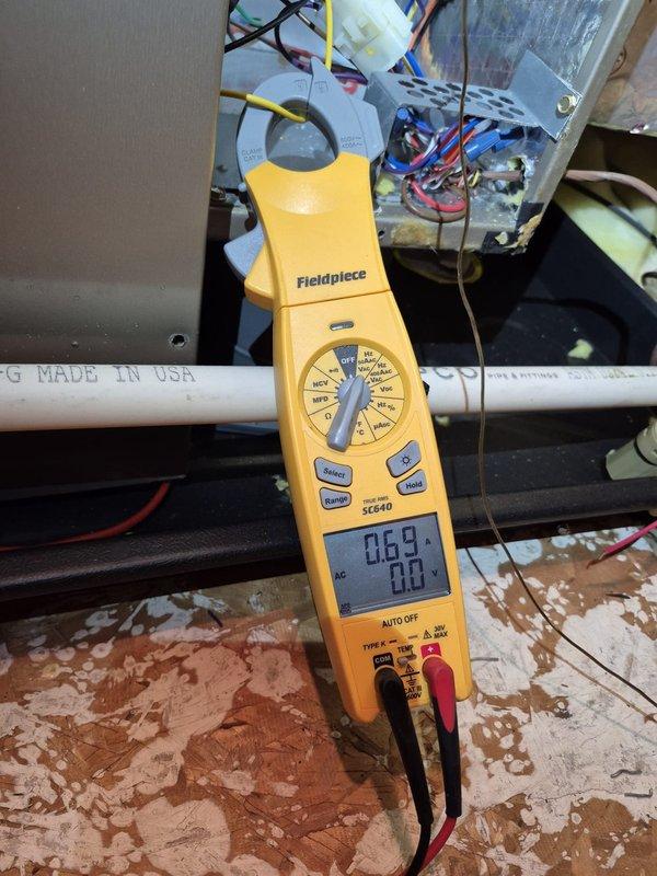 Performed re-inspection of single cooling system as requested. Conducted comprehensive electrical diagnostics using digital multimeter, measuring voltage and capacitance readings to verify proper system operation. All electrical components tested within normal operating parameters, capacitor readings confirmed at acceptable levels, and system found operating efficiently with no deficiencies noted.