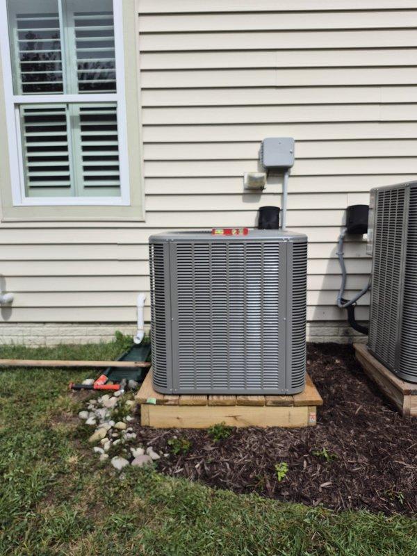 Responded to service call for recently installed HVAC system with concerns about condensing unit stability. Upon arrival, confirmed unit was sitting at an angle on wooden platform base, which had shifted from its original position. Used level to verify unit was not properly aligned, which can affect performance and potentially cause compressor damage over time. Documented condition with photos showing both the angled positioning and level measurements. Rescheduled return visit to properly level and secure both outdoor units on their wooden platforms to ensure stable operation and prevent future mechanical issues.