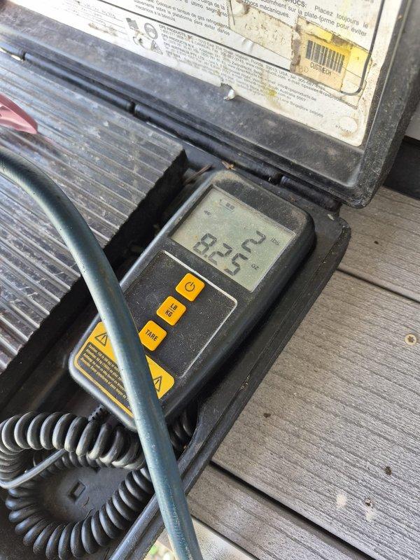 Performed cooling maintenance visit on two HVAC systems. Conducted diagnostic testing using digital temperature measurement equipment, recording 82.5°F at the heat exchanger/condenser unit, and utilized clamp meter to verify electrical readings of 9.74 amps with proper voltage levels. Inspected condenser coils, electrical connections, and wiring harnesses; all components found to be operating within normal parameters and system restored to proper cooling operation.
