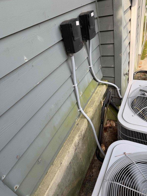 Responded to service call for two struggling multi-floor air conditioning systems. Performed comprehensive inspection of both outdoor condenser units, including electrical disconnect boxes, refrigerant levels, and operational testing. Completed maintenance tune-up procedures on dual system setup, addressing performance issues affecting second and third floor cooling zones.