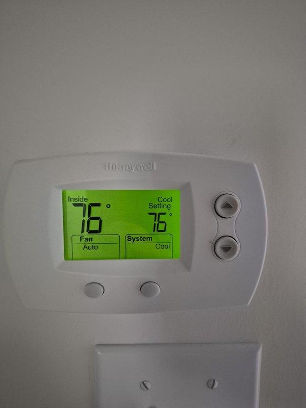 Completed routine cooling maintenance visit on two HVAC systems. Performed standard inspections, verified thermostat operations showing proper temperature control with units maintaining 76-78°F setpoints in cooling mode with fan set to auto, and documented system conditions through photographic records.