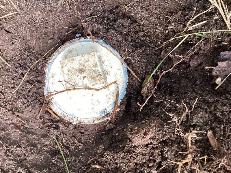 Responded to a blockage affecting a toilet and bathtub in a 1970s-era home. Located and accessed the exterior sewer cleanout, which showed signs of debris accumulation and weathering. Successfully cleared the obstruction through the cleanout access point, restoring proper drainage to both affected fixtures.