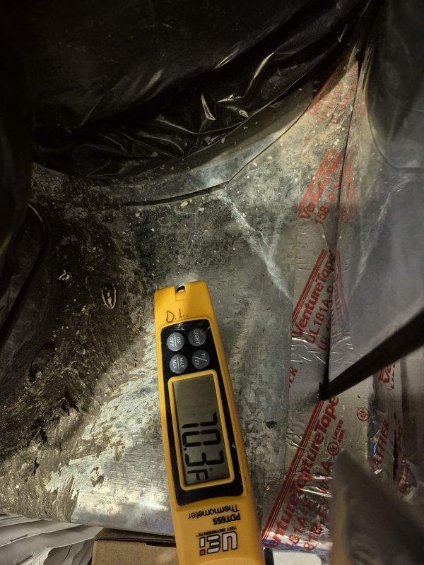 Performed routine cooling maintenance visit on HVAC system. Conducted electrical diagnostics using clamp meter, measuring amperage at 8.1A and voltage at 0.1V on system components. Inspected ductwork, noting accumulated dust and dirt on metal surfaces, and verified all electrical connections at unit panel with proper wire terminations intact.