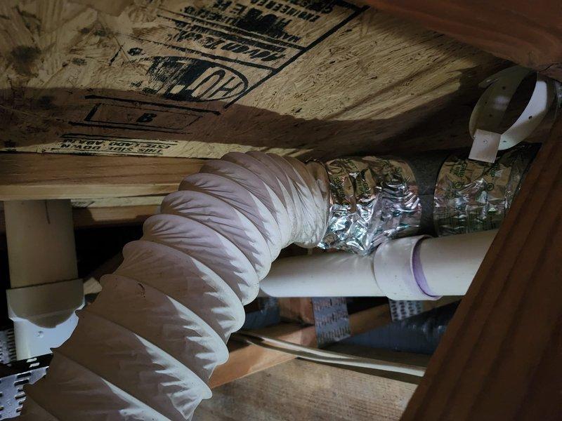 Responded to no heat call and investigated reported duct issues and leak around furnace area. Upon inspection, discovered significant deterioration and heavy soil accumulation on ductwork components near the furnace, along with visible moisture damage and corrosion staining on equipment panels. Identified compromised flexible ductwork connections in crawl space with inadequate sealing at PVC pipe penetrations. Documented conditions with photos showing degraded insulation, loose duct connections secured with metallic tape, and rust streaking on furnace cabinet indicating previous moisture intrusion. Addressed immediate concerns to restore proper system operation and airflow.