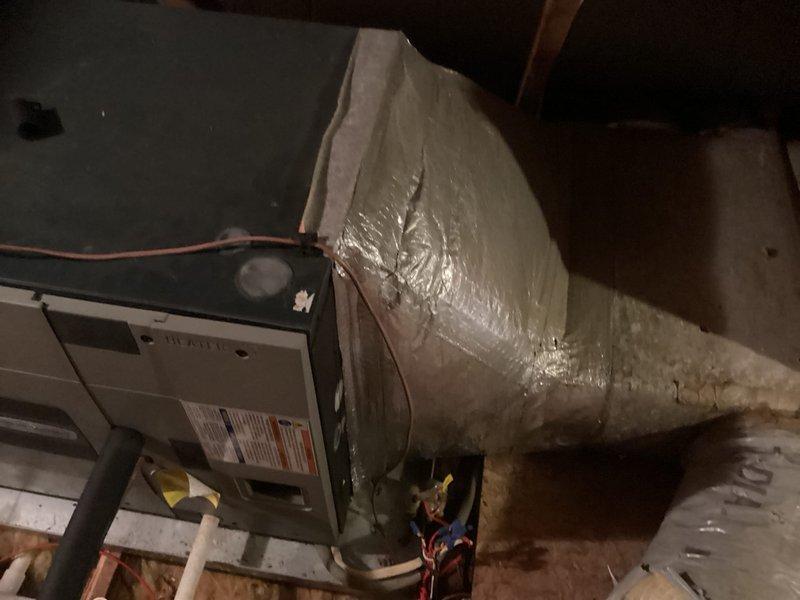 Evaluated 16-year-old HVAC system in attic installation that was out of refrigerant. Inspected air handler unit, flexible ductwork, and attic access for replacement estimate. Documented existing equipment configuration and installation conditions to provide comprehensive system replacement quote.