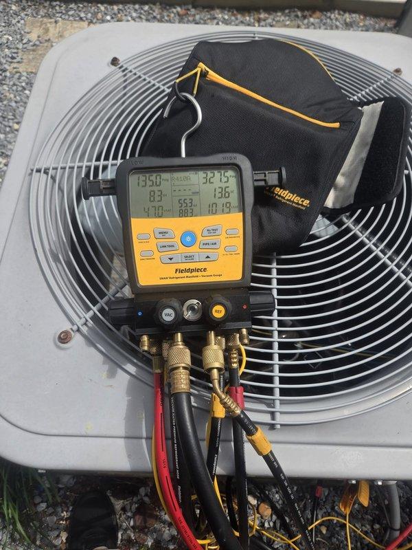 Responded to no-cooling call and found evaporator coil frozen. Instructed customer to turn system off and set thermostat to fan-only mode to allow ice to thaw. Returned after thaw period and performed full system diagnostics with manifold gauges, measuring operating pressures and temperatures. Verified proper system operation after defrost, with supply air temperature reading 73.8°F and normal condenser operation restored.