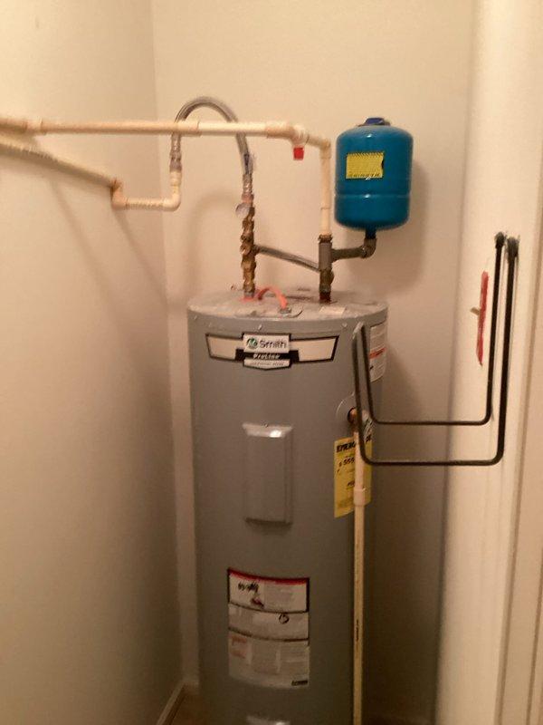 Performed comprehensive inspection and flush of residential tanked water heater. Conducted thorough evaluation of unit components, including pressure relief valve, expansion tank, and copper piping connections. Successfully flushed sediment from tank to improve heating efficiency and extend equipment lifespan. Verified proper operation of all shut-off valves and confirmed braided flexible connectors were secure. Unit tested and returned to normal service with all systems functioning properly.