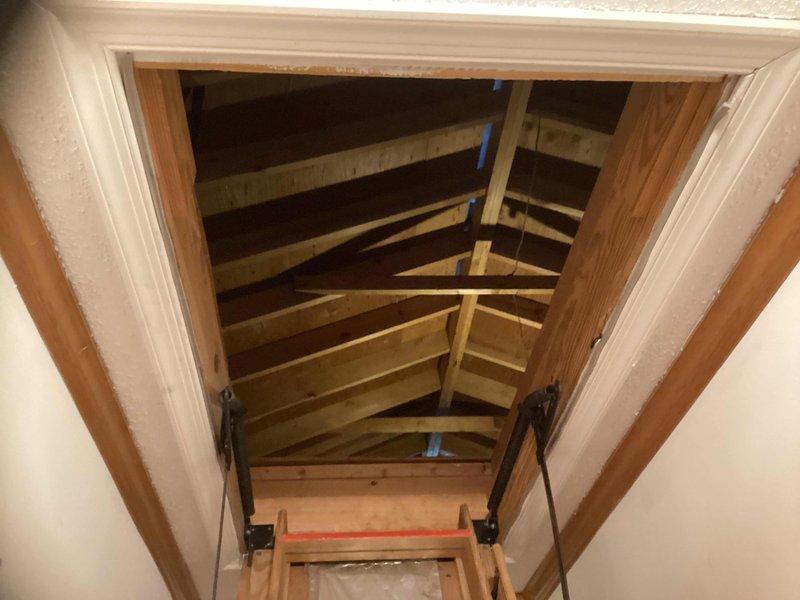 Completed HVAC estimate for multi-unit system replacement in residential attic space. Assessed existing equipment configuration, attic access conditions, and installation requirements for proposed air handler units with associated ductwork and condensate drainage systems. Documented current attic structural layout, clearances, and accessibility through ceiling-mounted access hatch to determine feasibility and scope of replacement work.