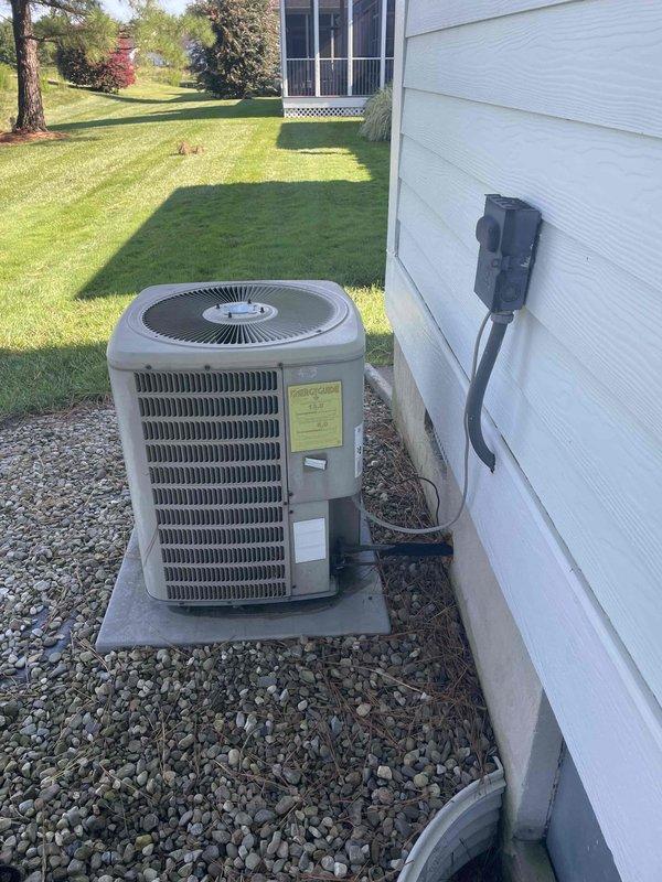 Responded to no cooling complaint on residential split system. Upon arrival, performed diagnostic evaluation of indoor air handler unit located in attic space and outdoor condensing unit. Inspected refrigerant lines, electrical connections, and condensate drainage system. Verified proper installation and mounting of equipment. System components appeared intact with normal wear for age. Completed visual inspection of both indoor and outdoor units, documented equipment condition with photographs for service records. Unit operational status assessed and findings communicated for resolution of cooling issue.