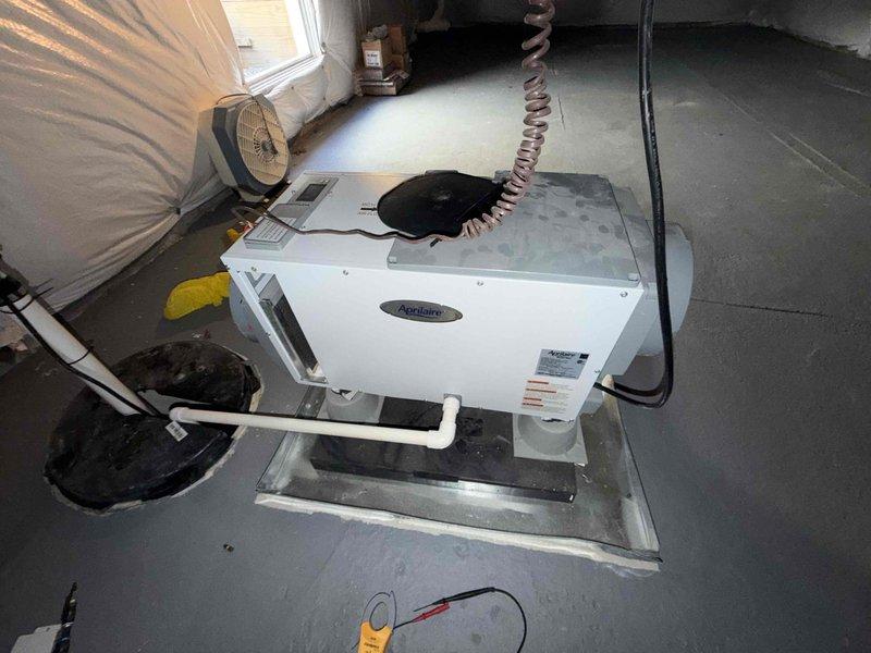 Responded to service call for Aprilaire humidifier system displaying E2 error code. Upon arrival, performed comprehensive diagnostic inspection of approximately 7-8 year old unit installed in attic space. E2 error typically indicates low water flow or water panel issues. Conducted full system evaluation including water supply line inspection, saddle valve operation verification, and water panel condition assessment. Checked electrical connections, transformer output, and humidistat calibration. Inspected drain line routing and condensate discharge. Tested water flow rate and pressure to humidifier. Examined solenoid valve operation and cleaned water distribution tray. Verified proper ductwork integration and airflow through humidifier cabinet. System restored to full operational status with error code cleared and normal humidification cycle confirmed.