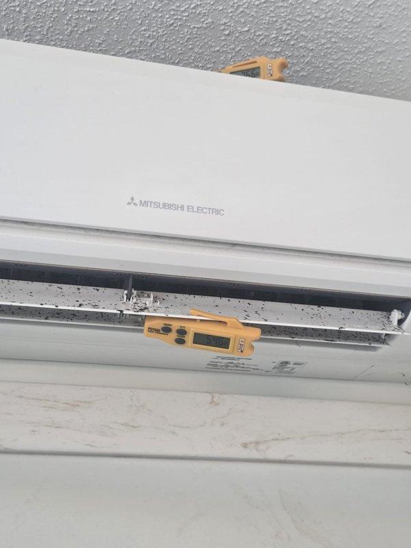 Responded to no cooling complaint on Mitsubishi Electric mini-split system. Upon arrival, performed diagnostic assessment of wall-mounted air handler unit. Utilized digital temperature measuring instruments to verify air discharge temperatures and evaluate system performance. Inspected indoor unit for proper operation, checked air intake vents, and assessed air distribution louvers functionality. Documented system condition with diagnostic readings from multiple points on the unit. System evaluated and measurements recorded to determine root cause of cooling deficiency.