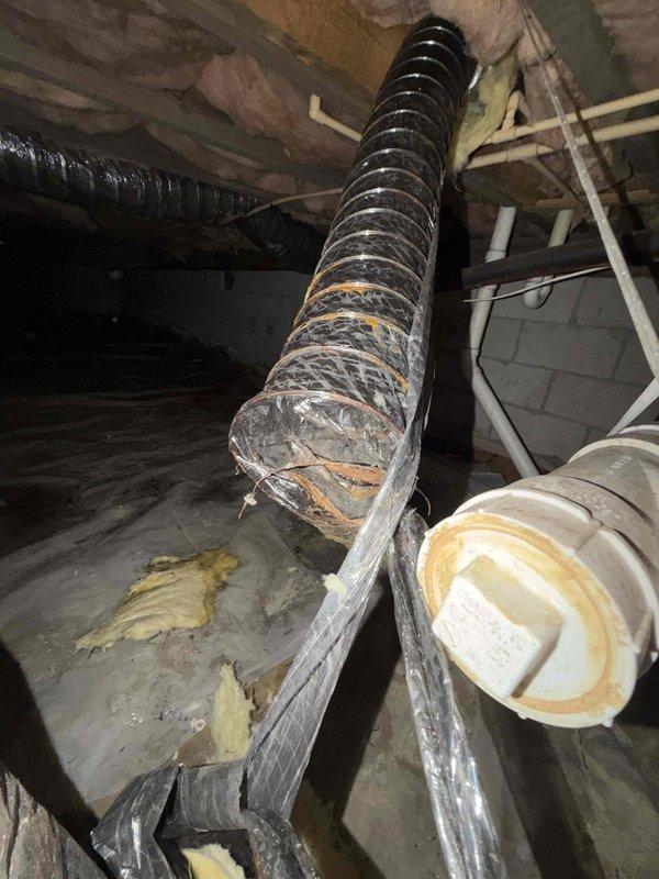 Responded to no cooling complaint and investigated crawlspace after customer reported hearing a crash under bathroom area. Located disconnected flexible ductwork in crawlspace that had separated from the system, causing complete loss of conditioned air to affected zones. Reconnected and secured the ductwork section, verified all connections were properly sealed, and restored airflow throughout the system. System tested and confirmed operating normally with proper cooling restored to all areas.